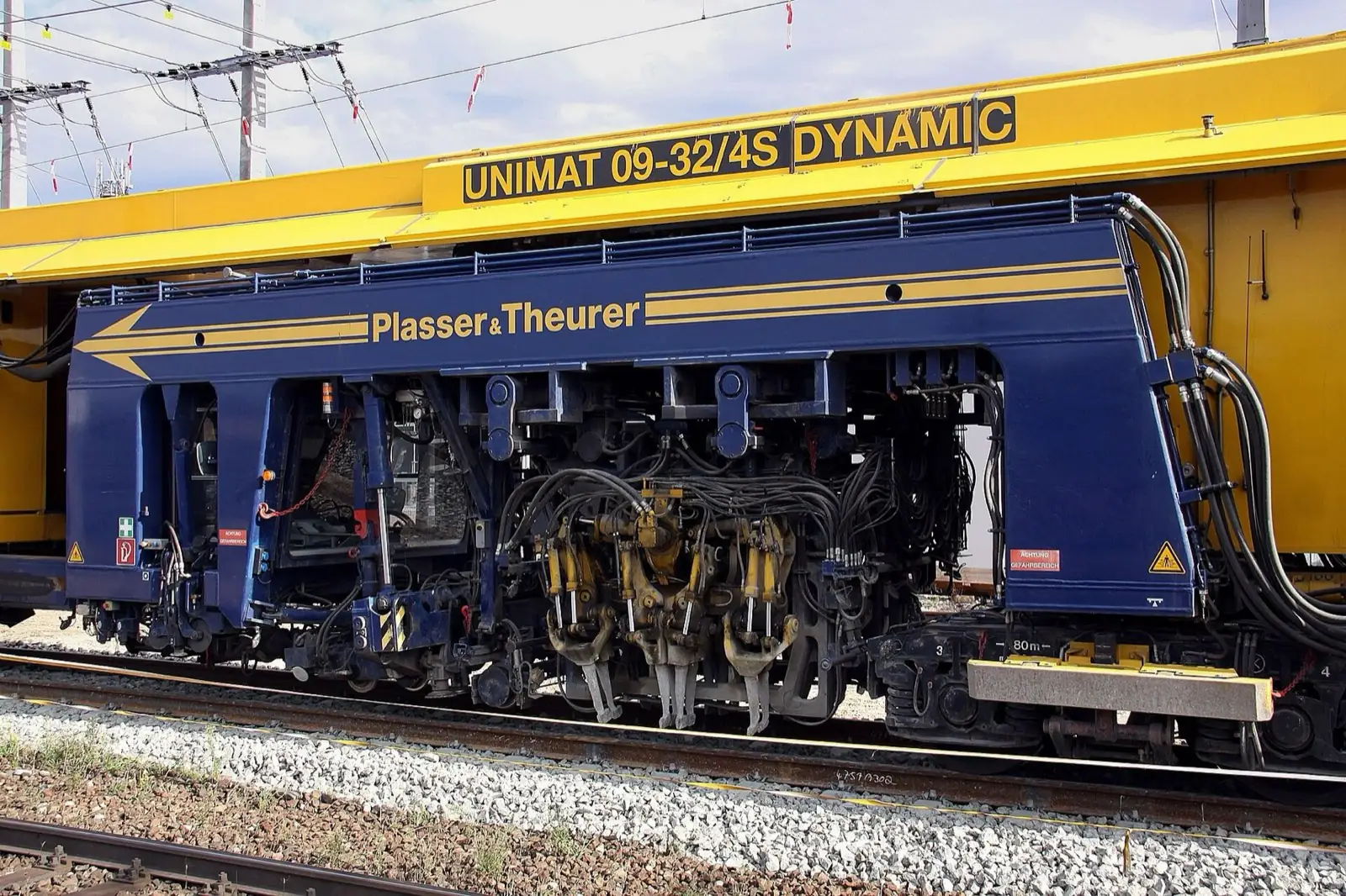 Production tamping machine working on track